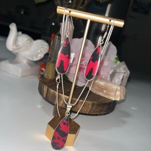 Red and black necklace and earring set.